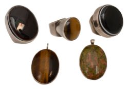 A group of hardstone rings and pendants