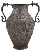 A late 19th century Indian Kashmiri chased silver twin handled vase