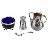 A late Victorian silver cream jug, a pepper mill and a sugar basin, spoon