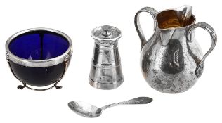 A late Victorian silver cream jug, a pepper mill and a sugar basin, spoon