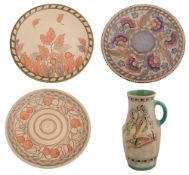 A Charlotte Rhead pottery jug and three plates