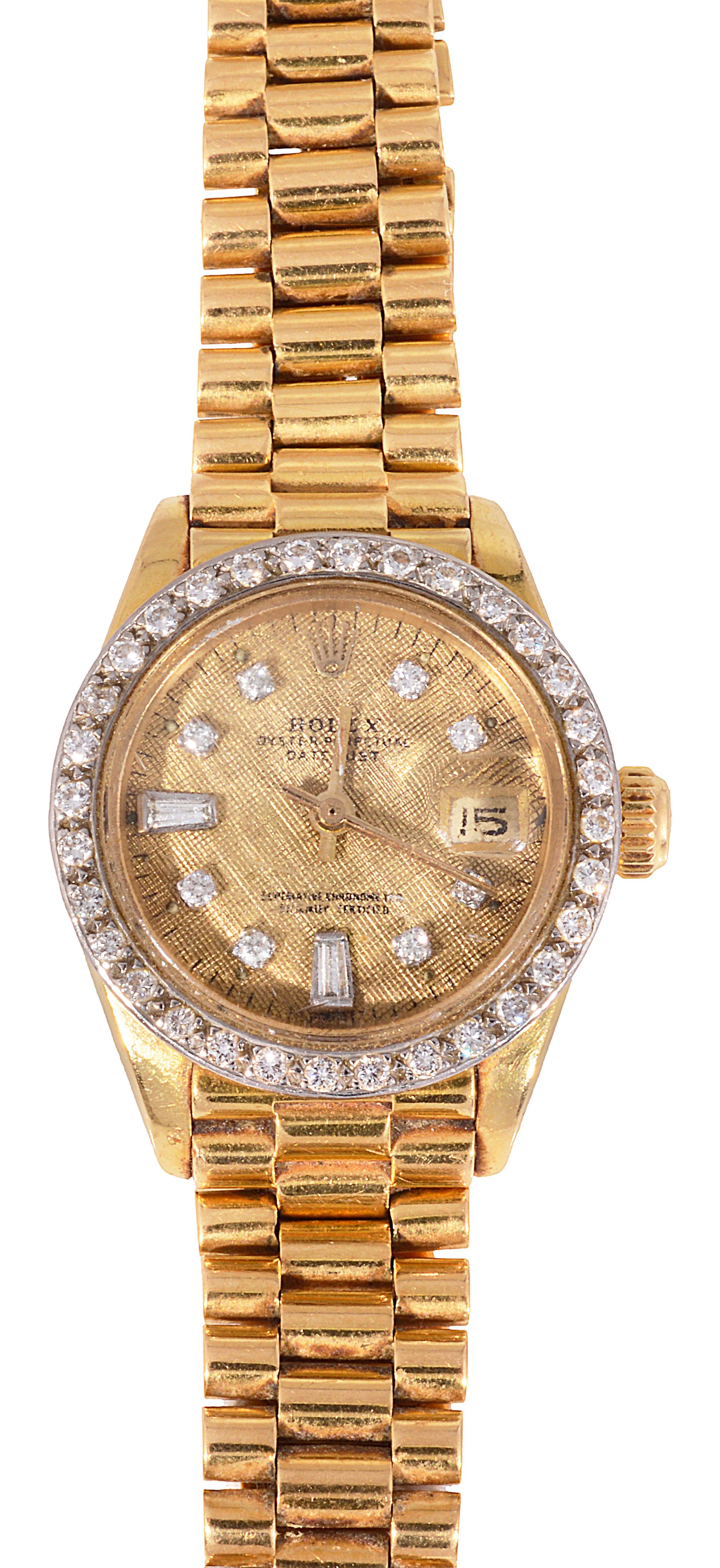 A lady's gold and diamond Rolex Oyster Watch