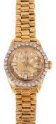A lady's gold and diamond Rolex Oyster Watch