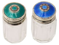 Two silver-gilt and enamel topped salt and pepper shakers