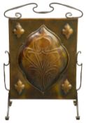 An Arts & Crafts wrought iron and copper firescreen