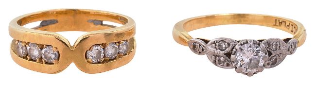 An 18ct yellow gold and diamond ring with a single stone ring