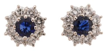 A pair of sapphire and diamond-set cluster earrings