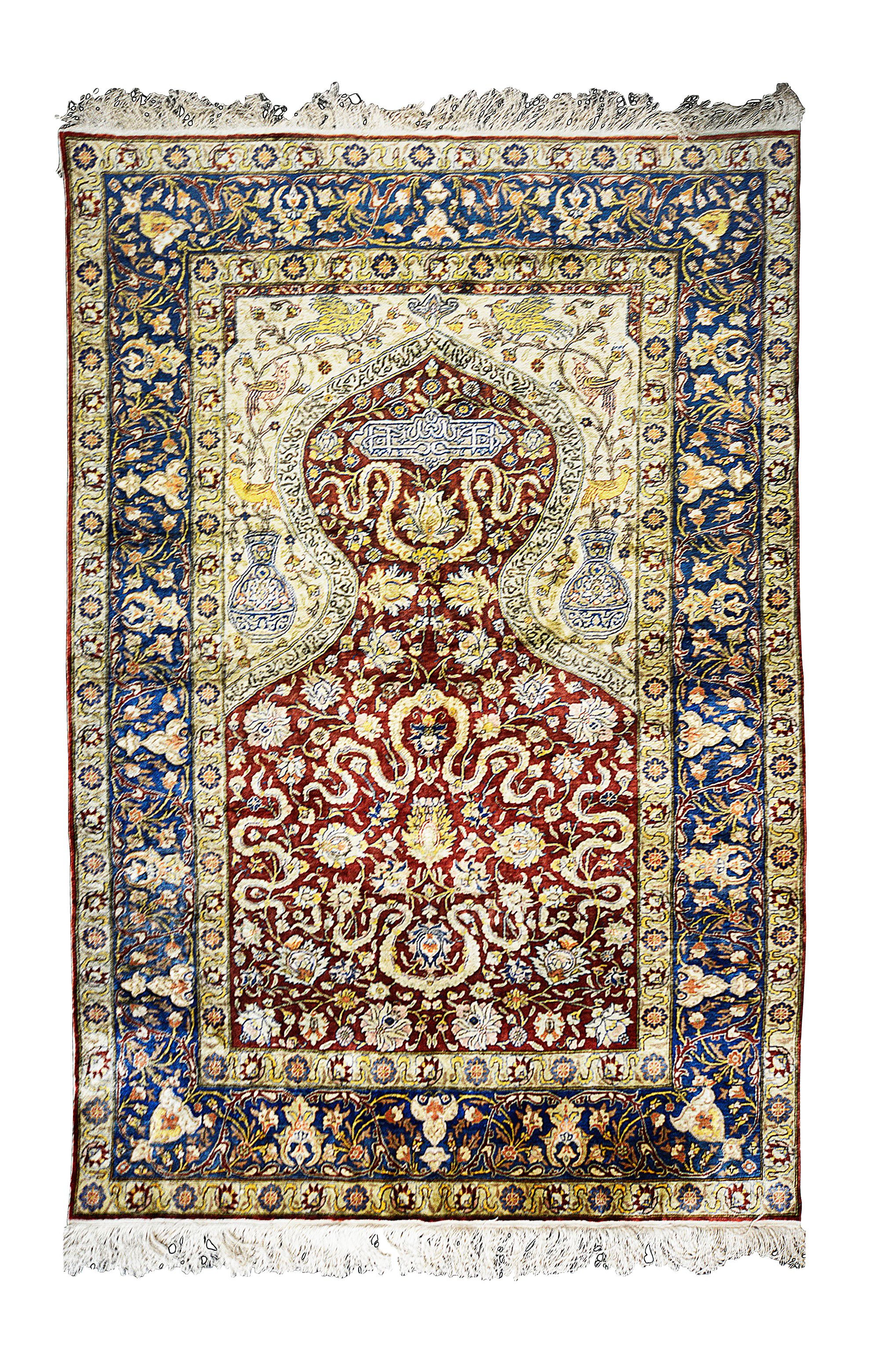 A Hereke silk and metal thread prayer rug