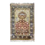 A Hereke silk and metal thread prayer rug