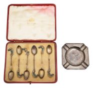 Silver gilt and plique-a-jour coffee spoons and an ashtray