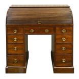 A George III mahogany cylinder top bureau