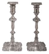 A pair of George V silver candlesticks in George II style