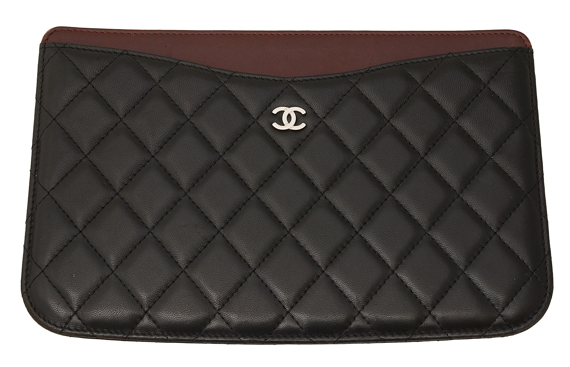 A Chanel black and burgundy travel wallet