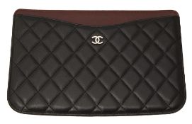 A Chanel black and burgundy travel wallet