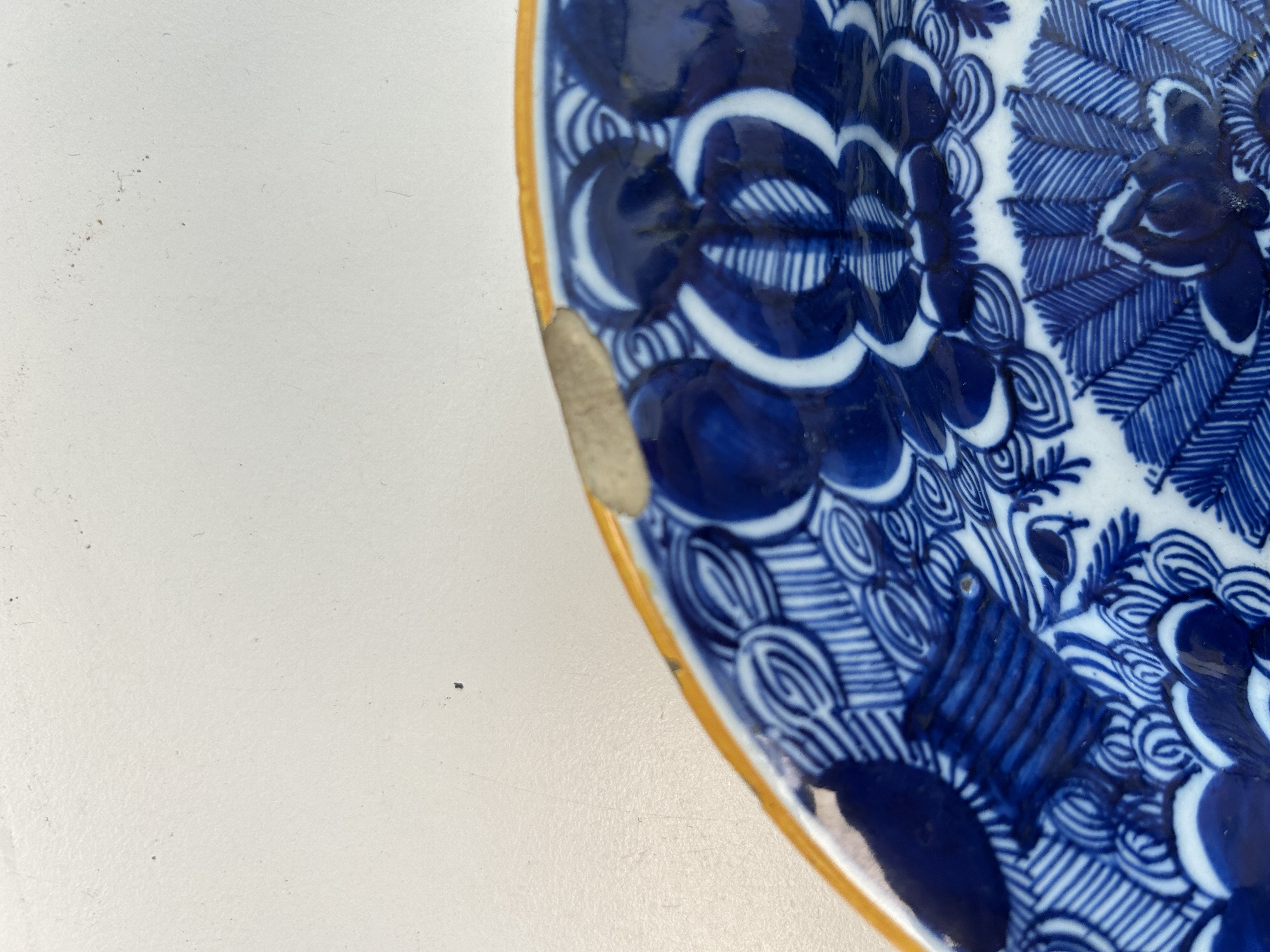 An Dutch Delft blue and white charger and a 'Peacock' plate - Image 3 of 5