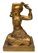 A bronze figure of the Snake Dancer