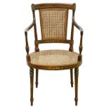 A mid 19th century painted mahogany armchair, in the Sheraton style