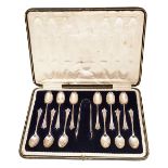 A cased set of twelve Edwardian silver Albany pattern coffee spoons