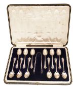 A cased set of twelve Edwardian silver Albany pattern coffee spoons