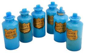 A set of six blue opaline glass apothecary bottle