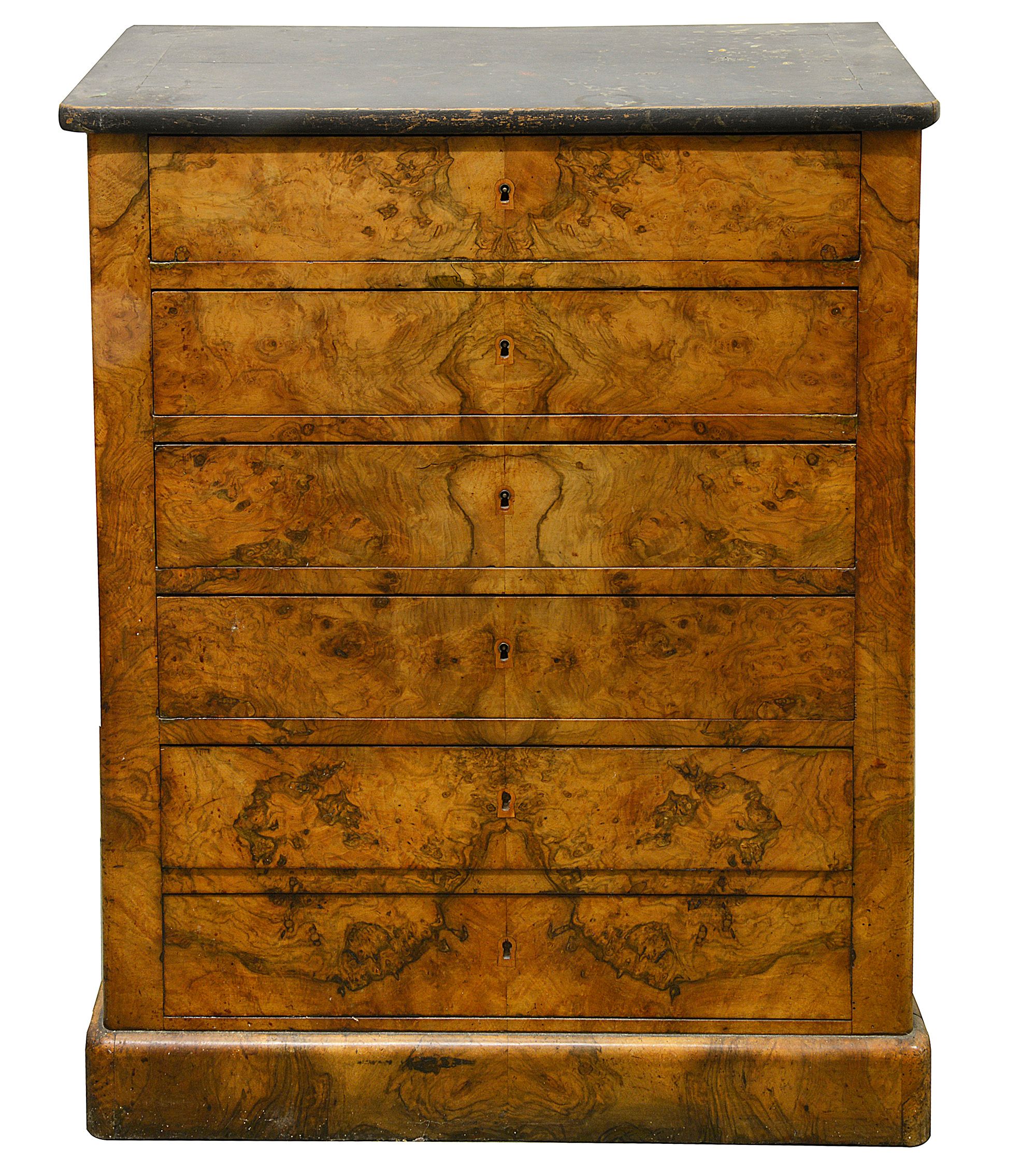 A French Louis Phillippe figured walnut commode