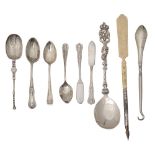 A Continental silver figural top spoon and other items