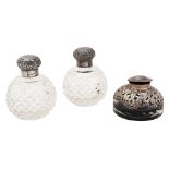 A pair of silver mounted glass scent bottles and an inkwell