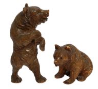 A Black Forest carved wood figure of a standing and seated bear