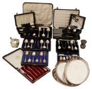 A collection of silver & electroplated sets of spoons & other items