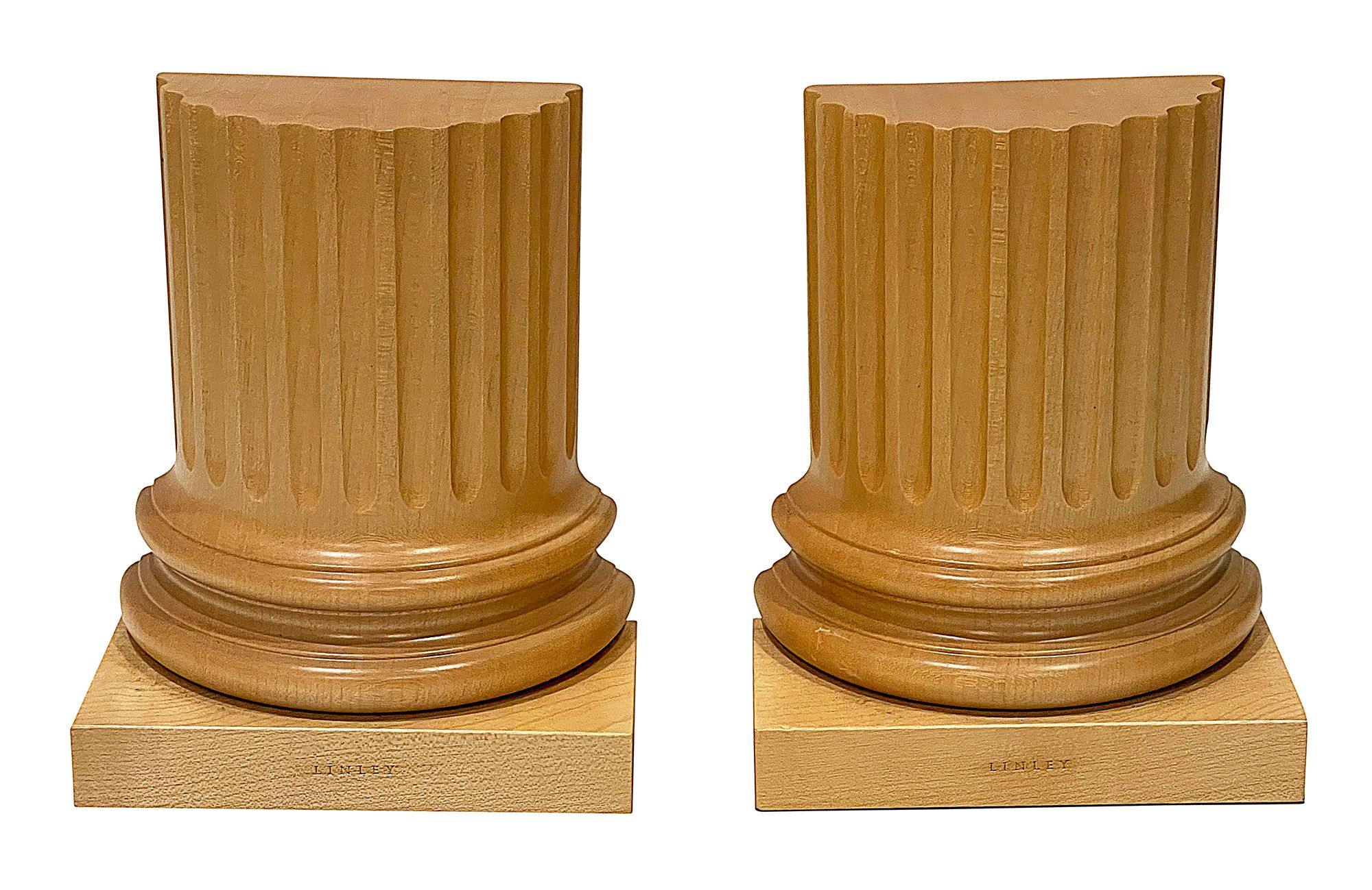 A pair of carved sycamore Greek part column bookends