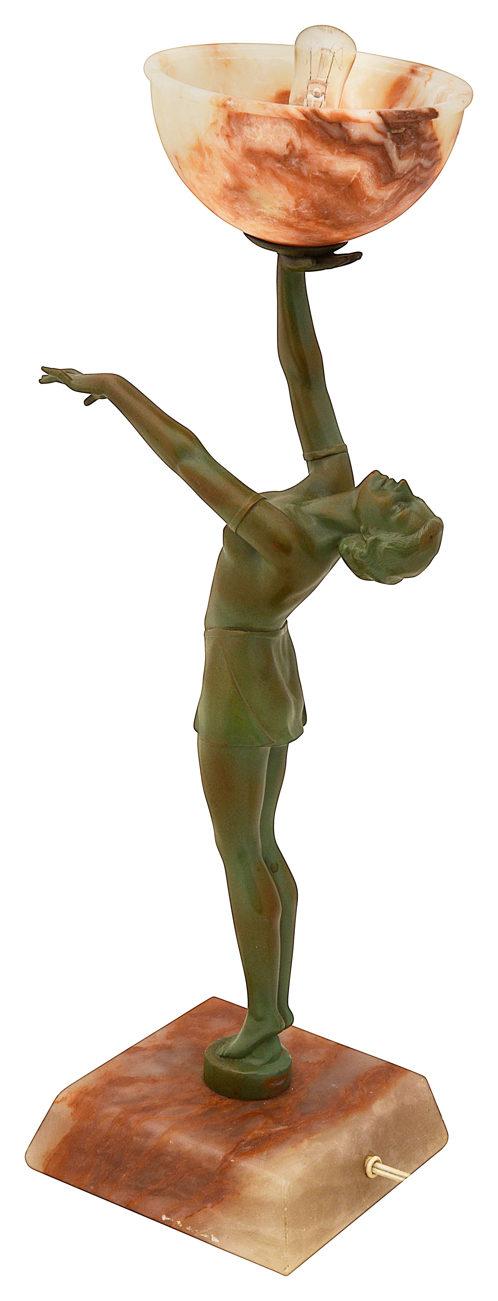 An Art Deco bronzed spelter and alabaster figural lamp