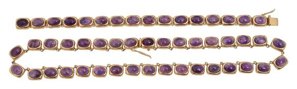An amethyst necklace and matching bracelet