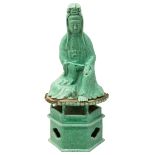 A Chinese green crackle glazed figure of Guanyin on plinth