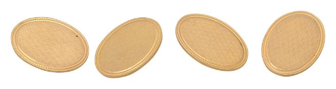 A pair of 9ct gold oval cufflinks