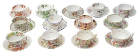 A collection of 13 early 19th century tea cups and saucers