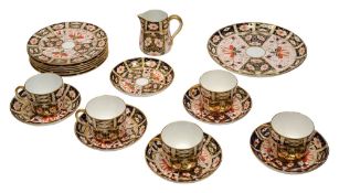 A Royal Crown Derby Imari part tea service decorate in 2451 pattern