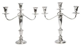 A pair of modern American silver three light candelabra