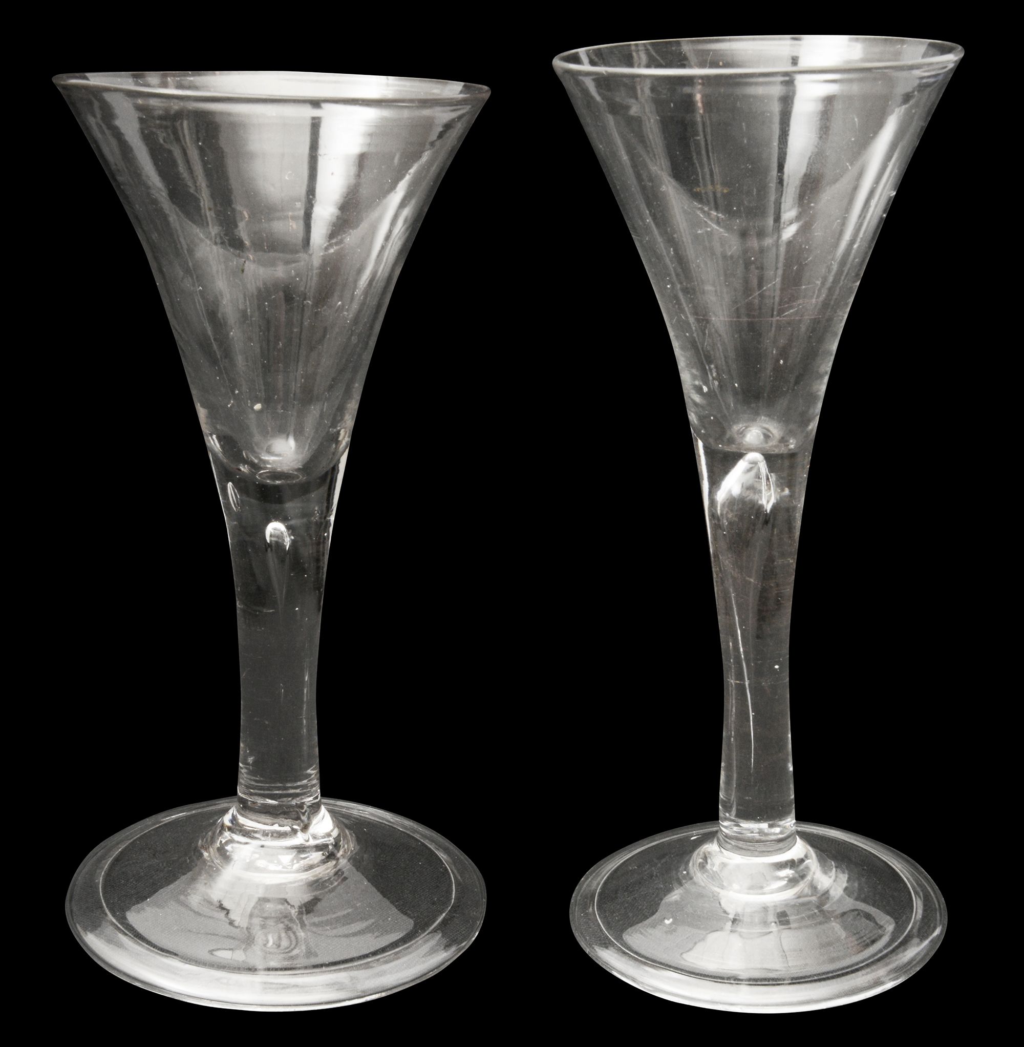 Two mid 18th century plain stem wine glasses