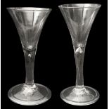 Two mid 18th century plain stem wine glasses