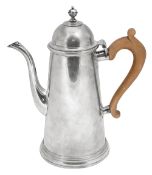 A George V silver coffee pot in George I style