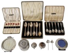 Silver to include a Burmese lidded pot, cased sets of spoons and other items