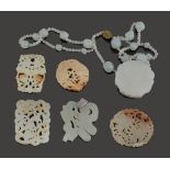 A Chinese mutton fat jade pendant necklace and five plaques