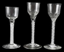 Three 18th century opaque twist wine glasses c.1760-5