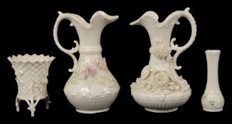 Two Belleek flower encrusted jugs and two vases