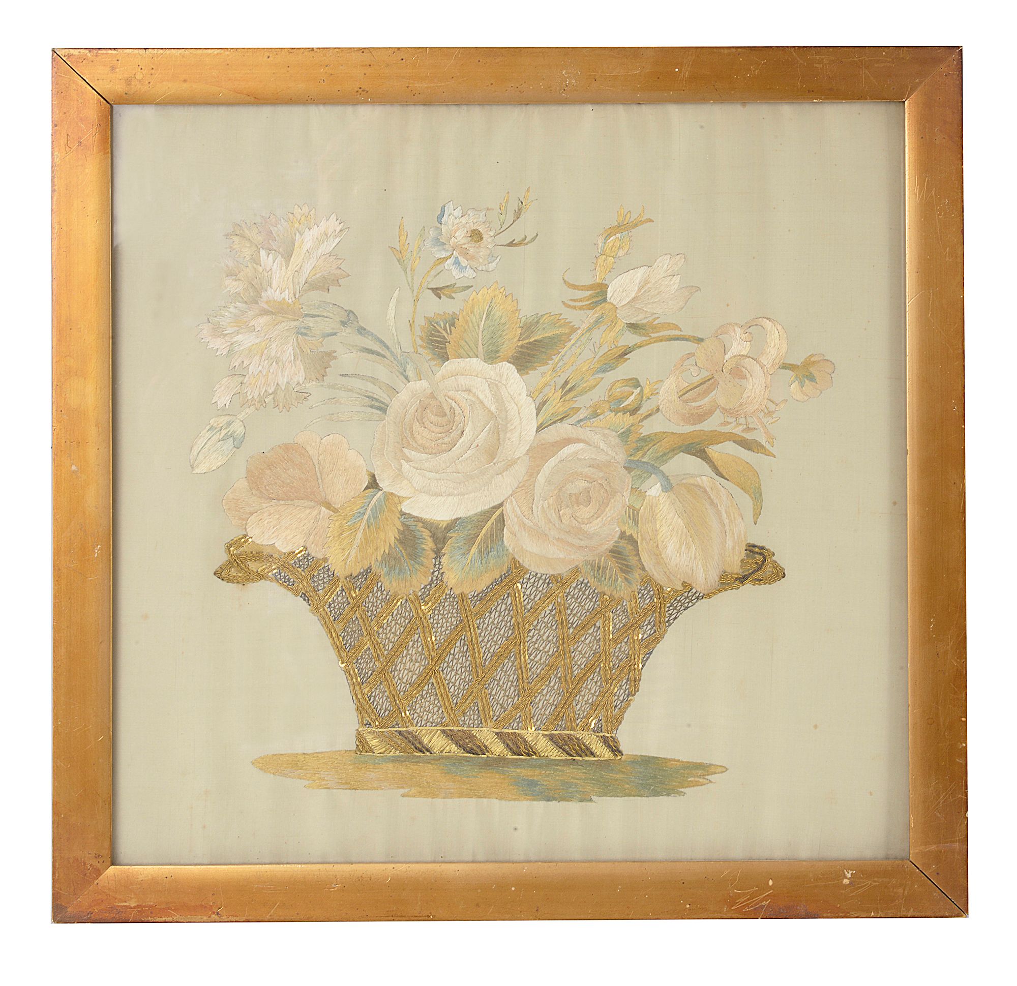 An early 19th century embroidered silk picture of a flower basket
