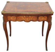 A French Louis XV style rosewood and marquetry games table