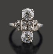 An early 20th century diamond two stone and plaque ring,