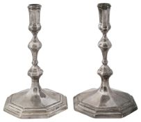 A pair of Elizabeth II cast silver tapersticks in George I style