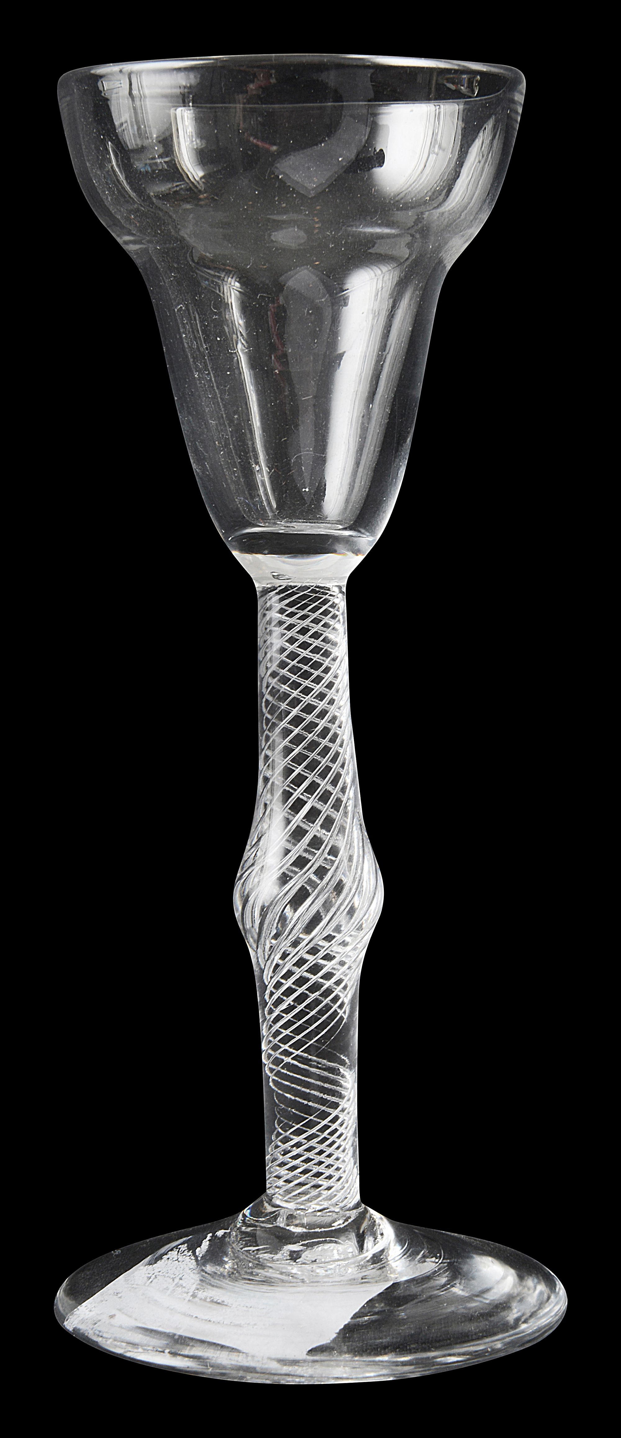 A mid 18th century pan top airtwist wine glass c.1755