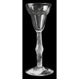 A mid 18th century pan top airtwist wine glass c.1755